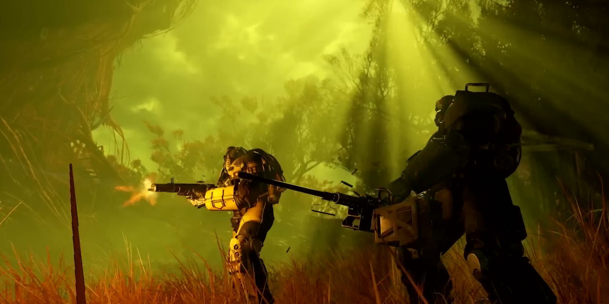 Players wearing power armor shooting in Fallout 76 Wastelanders Trailer