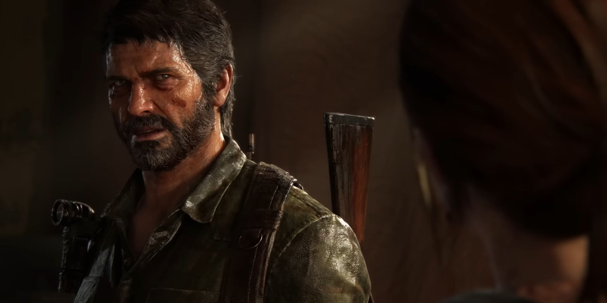 Joel looking at Ellie in the pre-purchase trailer for Last Of Us Part 1 2022 Remake