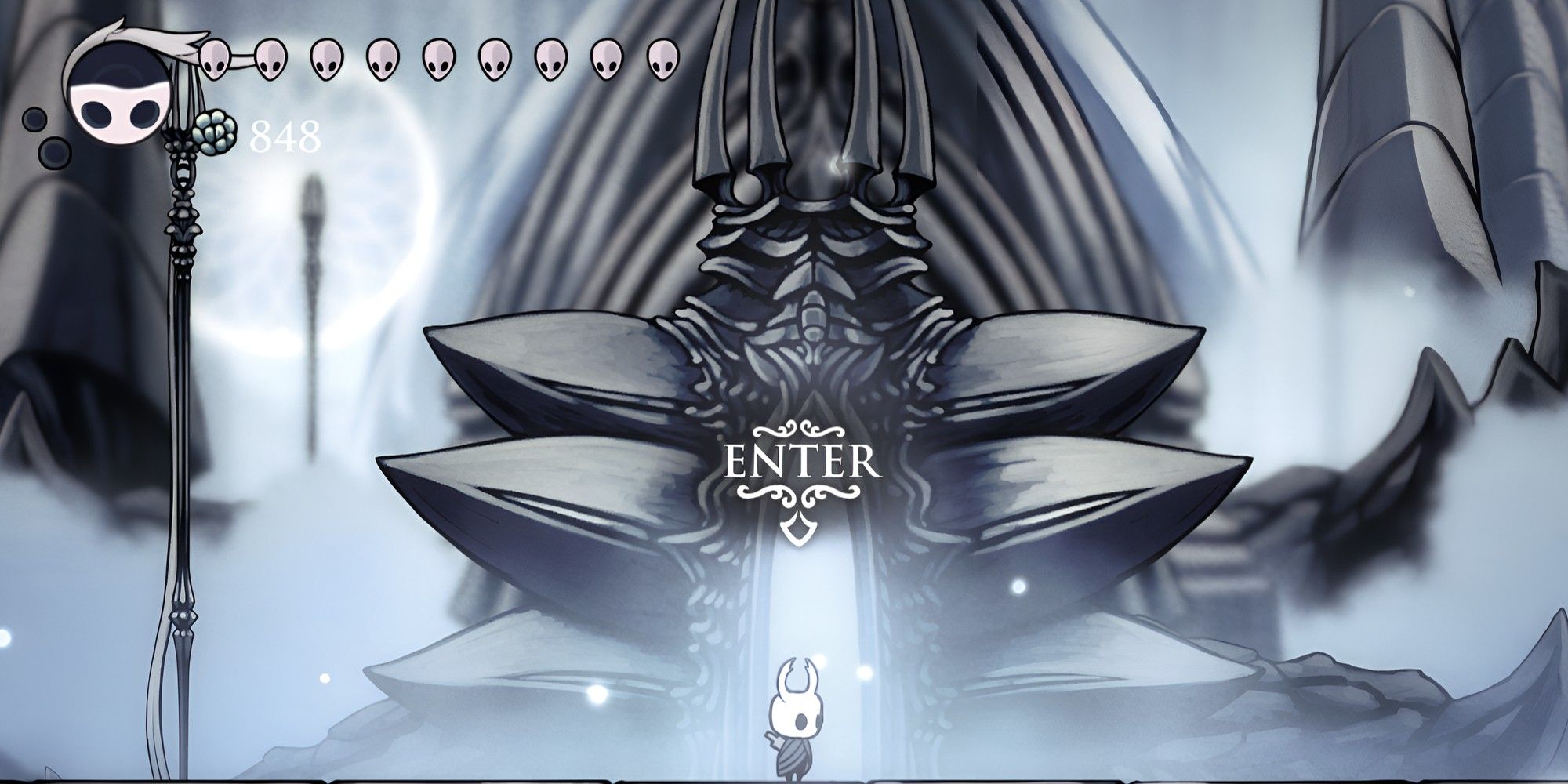 The Knight in Hollow Knight standing in front of the entrance to the White Palace