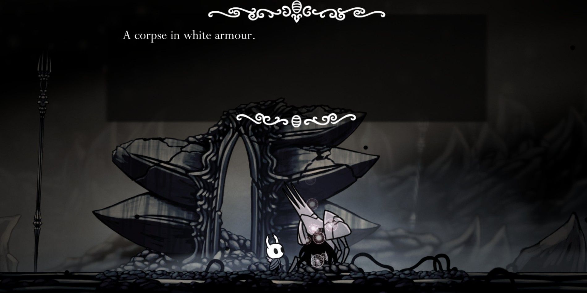 The Knight in Hollow Knight standing near a Kingsmould Corpse