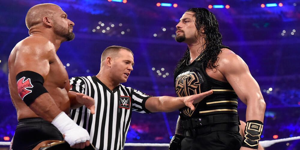 Roman Reigns vs Triple H