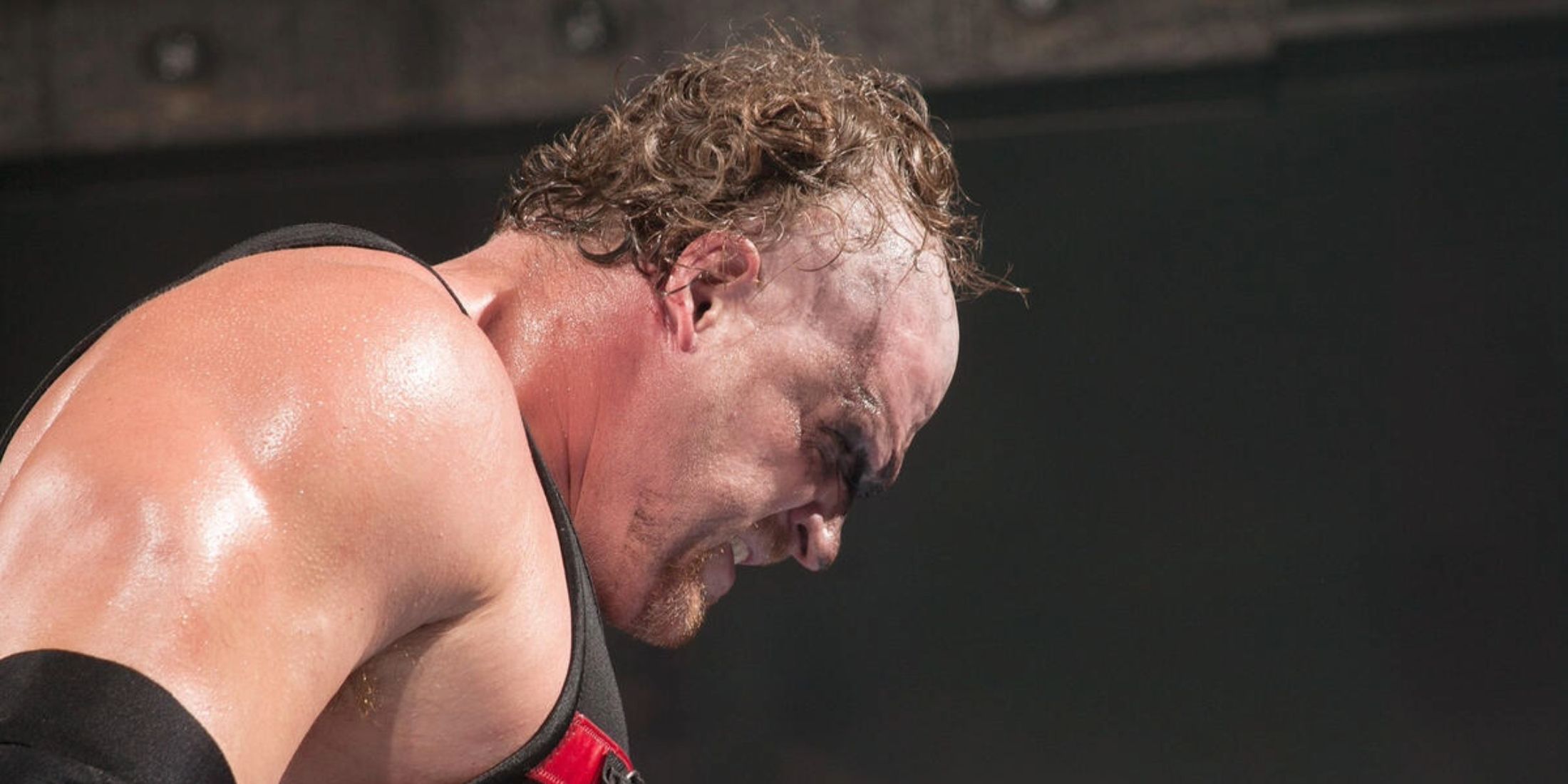 Kane takes off the mask WWE