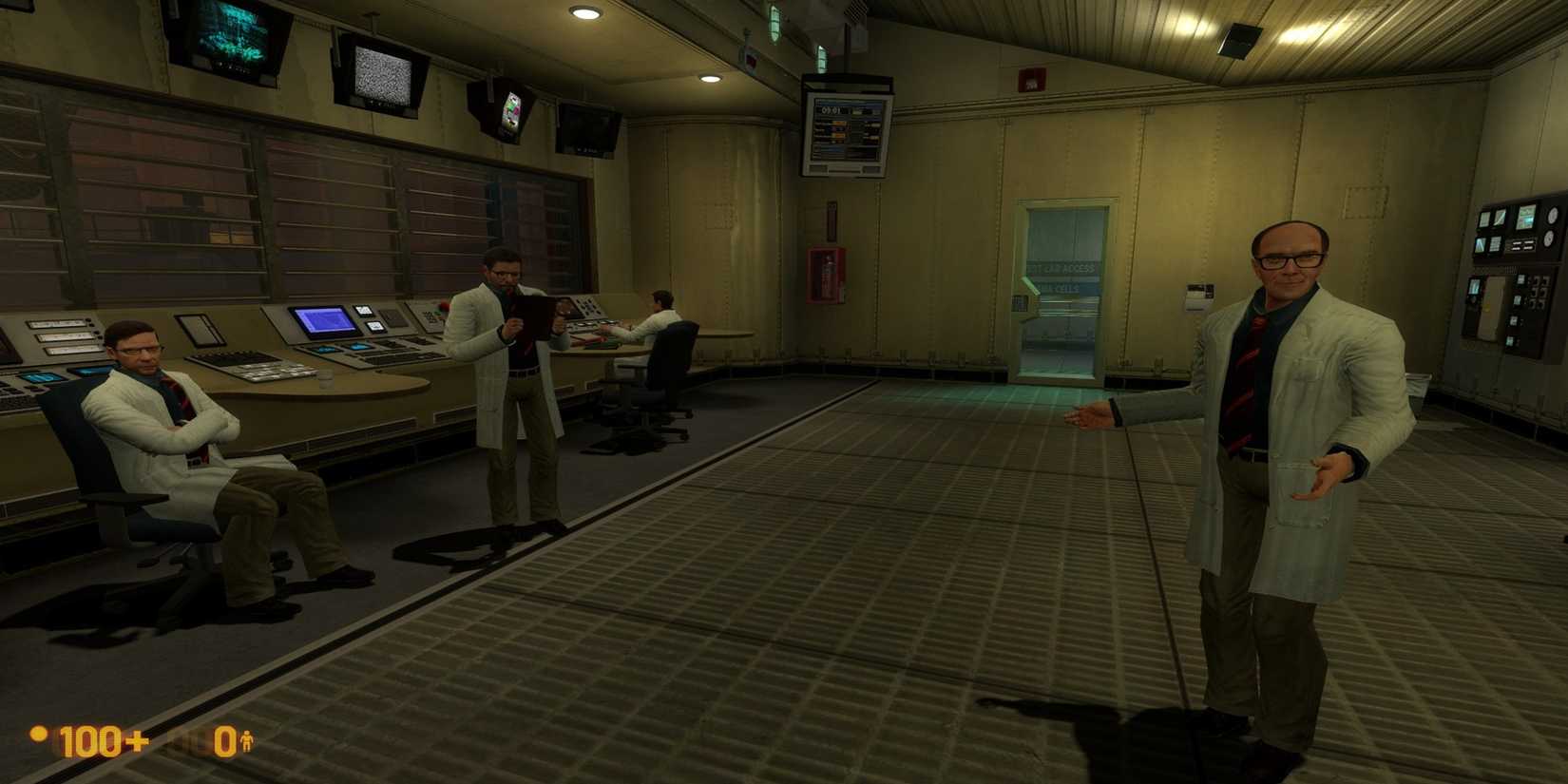 gordon talking to scientists in the lab
