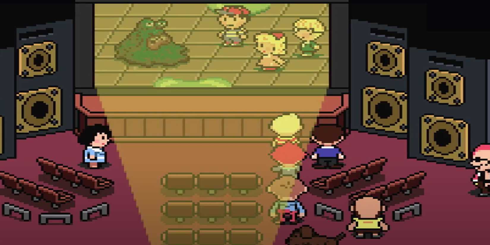 the party from mother 3 in front of a projector