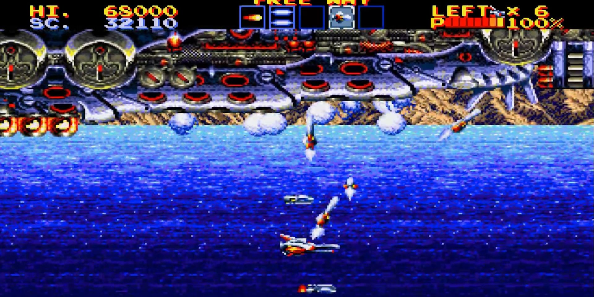 Screenshot of Thunder Force IV with the player shooting missiles at a massive ship.